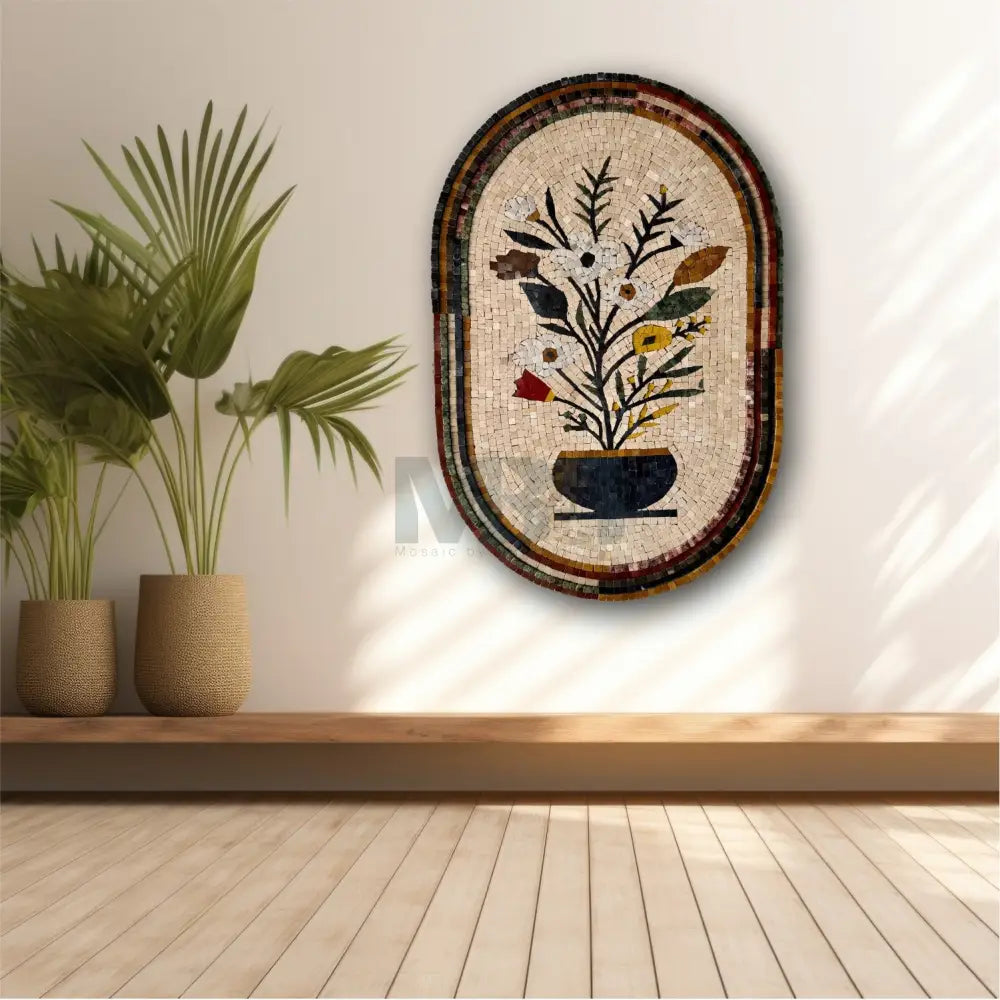 Decorative mosaic wall art with floral design on a wall with plants and wooden shelf.